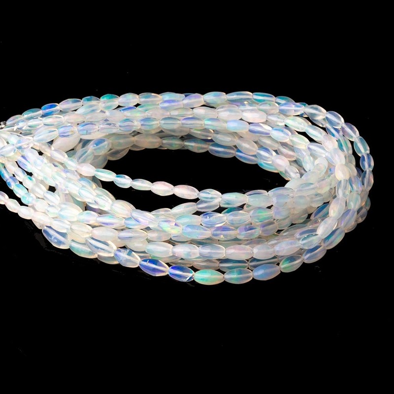 4-9.5mm Ethiopian Opal Plain Rice Beads 18 inch 66 pieces AA (ONLINE ORDER ONLY)