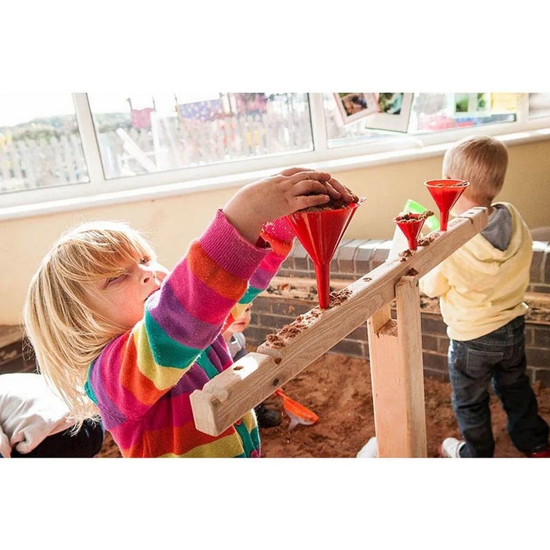 Giant Scales And Funnel Stand And White Buckets